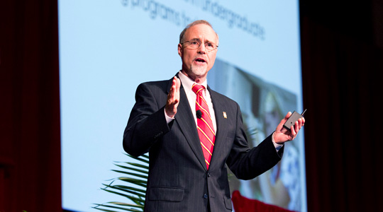Tom George delivers Chancellor's Report to the Community