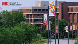 View down West drive, Express Scripts and ABH in the background with campus banners for Zoom