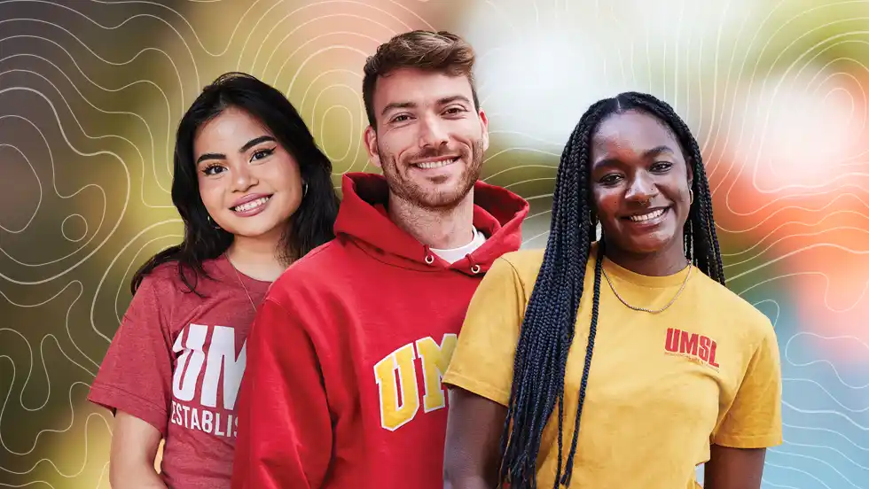 Group photo of three UMSL students wearing UMSL apparel