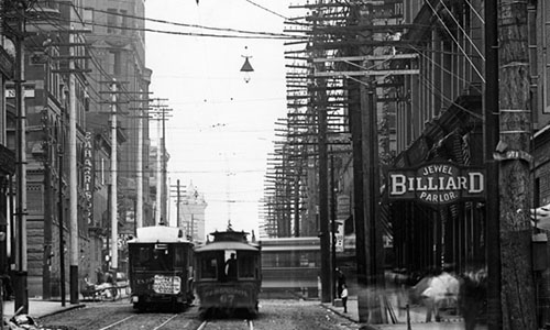 black and white st. louis street with street cars