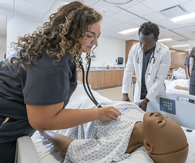 nursing students in the simulation lab