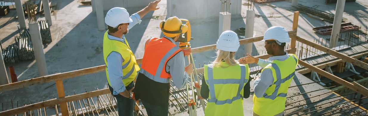 four people working in civil engineering