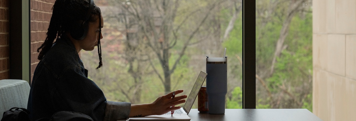 student at table